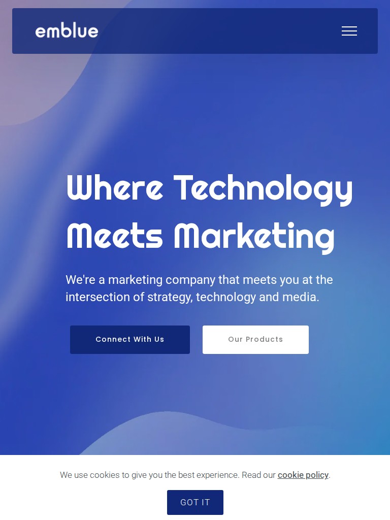 Emblue website homepage with the headline Where Technology Meets Marketing on tablet