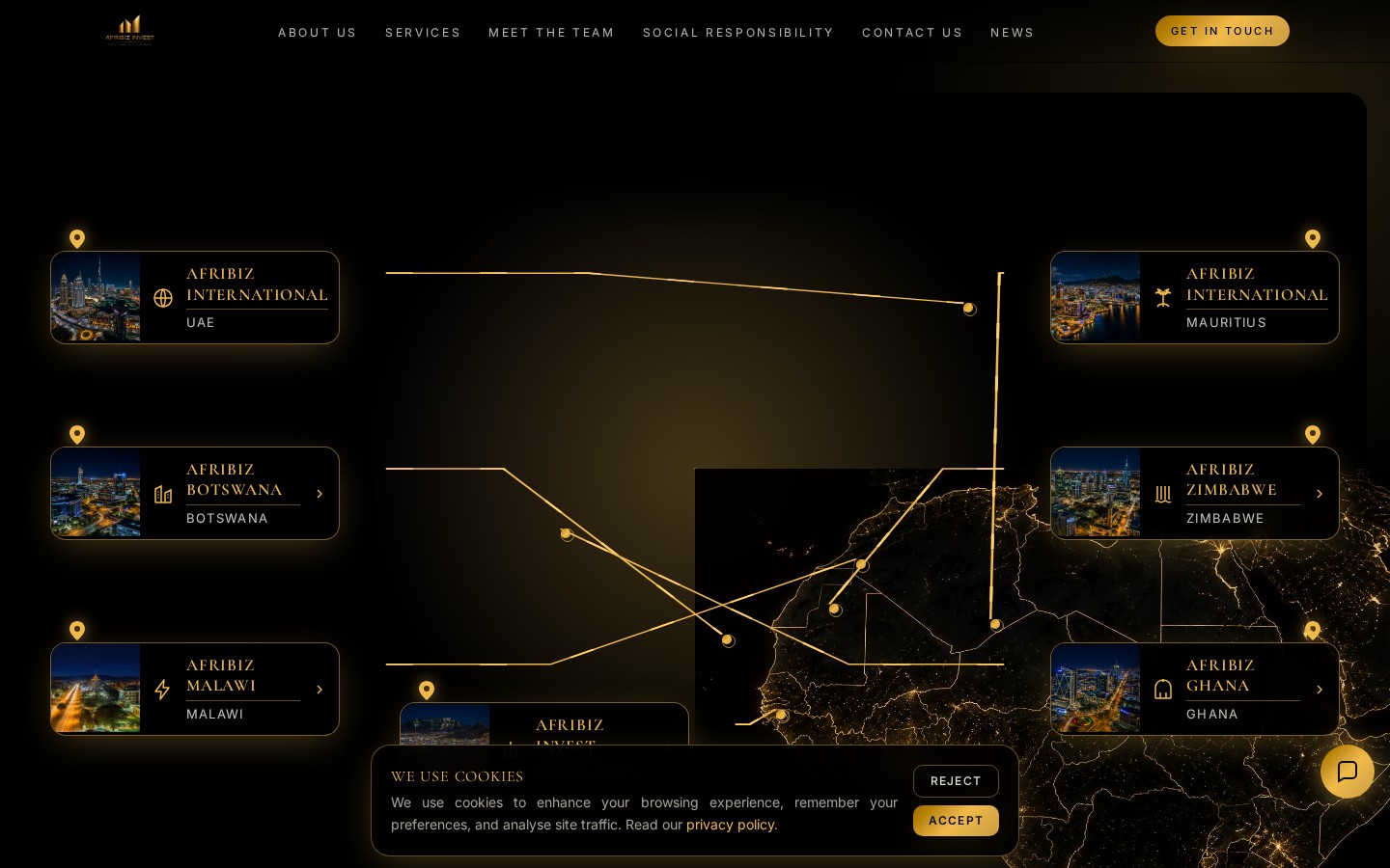 Afribiz Invest website showing a gold-lit night map of Africa with country offices on desktop