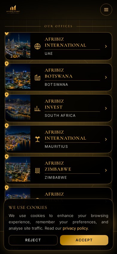 Afribiz Invest website showing a gold-lit night map of Africa with country offices on mobile