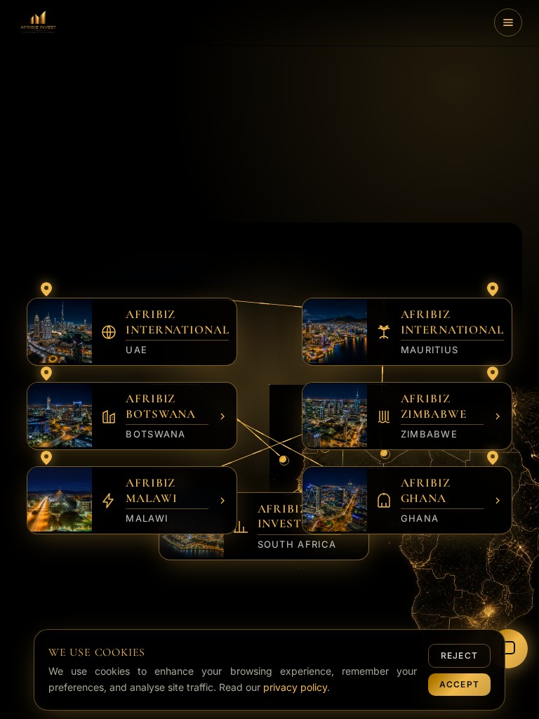 Afribiz Invest website showing a gold-lit night map of Africa with country offices on tablet