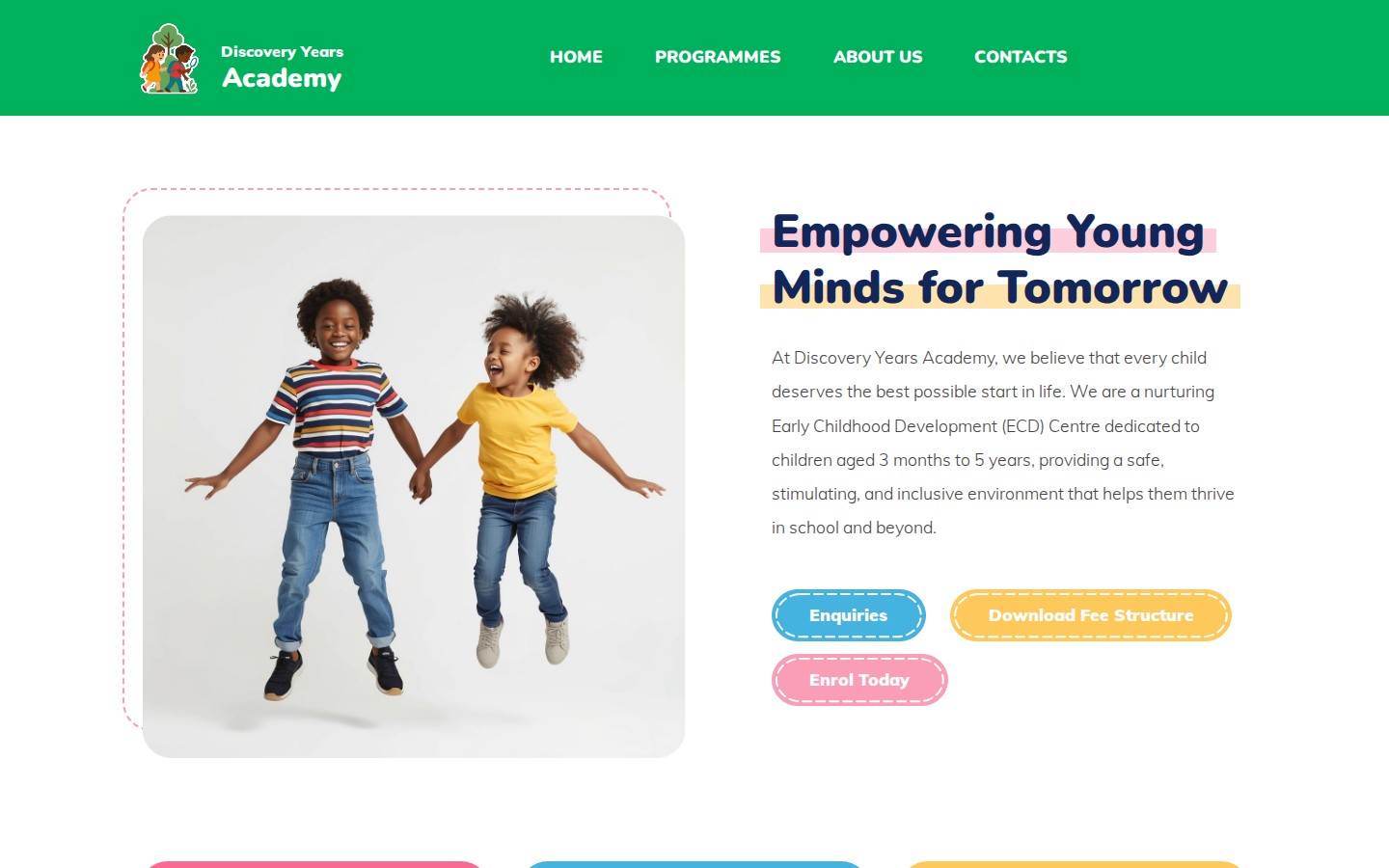 Discovery Years Academy homepage showing two children jumping beside a message about empowering young minds on desktop